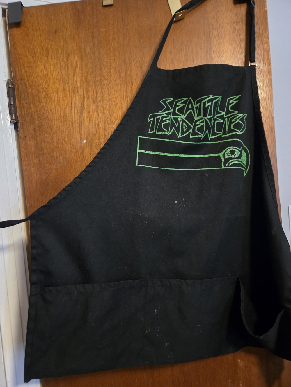 Seattle Tendencies Black Apron with Green Graphic